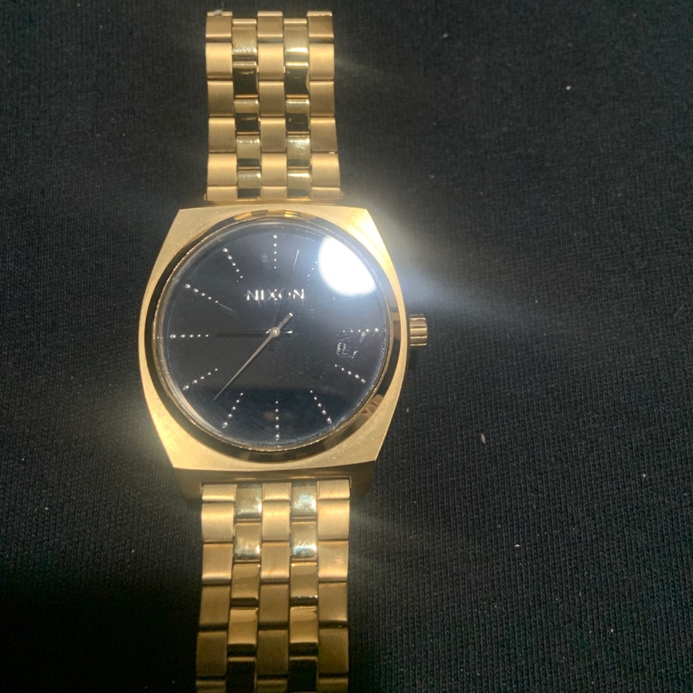 Gold tone Nixon watch like new